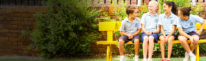 St-Patricks-Kogarah students sitting on school bench